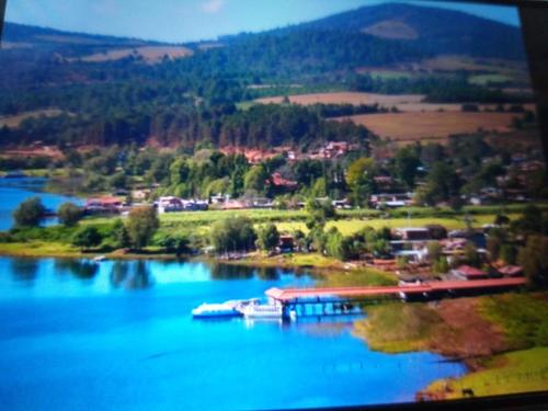 Фотография гостиницы CABAÑAS ZIRAHUEN LOS ANGELES