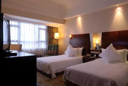 Фотография гостиницы Merry Hotel Shanghai (Former Rendezvous Merry Hotel Shanghai)