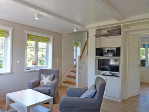 Фотография гостевого дома Friesenhaushälfte Backbord