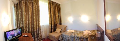 Фотография номера гостиницы АМАКС Курорт Орбита