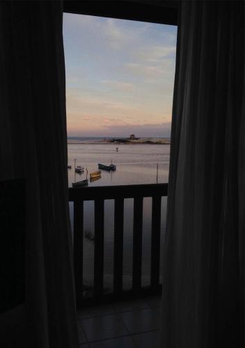 Фотография гостевого дома Casa Rio - 04 Quartos de Frente para o Mar