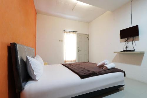 Фотография гостевого дома El Dhiya Syariah Tangerang