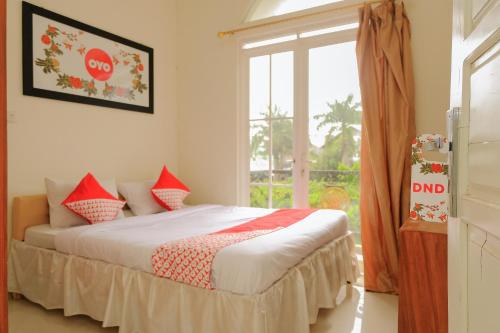 Фотография гостиницы Vaccinated Staff - OYO 414 Loji Rejo Guest House