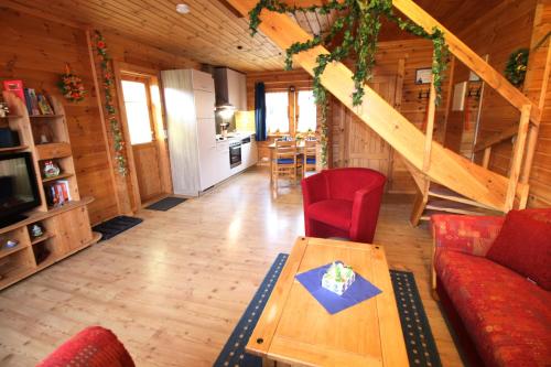 Фотография гостевого дома Der Fuchsbau Blockhäuser