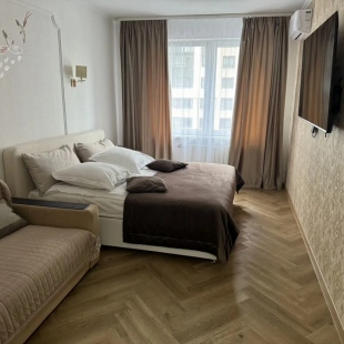 Фотография квартиры Апартаменты Beige на проспекте Куприна 34к1