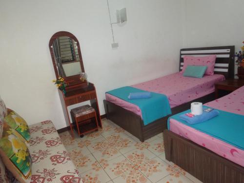 Фотография гостиницы Vaccinated Staff - OYO 906 Bann One Love