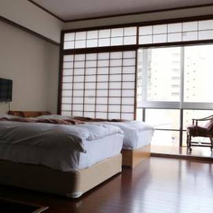 Фотографии гостиницы 
            Izu 4 sea ocean reinforced con Double bed + single bed 2 sea view (room