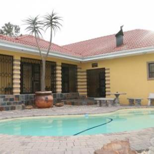 Фотографии гостевого дома 
            Mi Casa Guest House