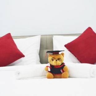 Фотографии гостевого дома 
            Holidays Vacation Suite