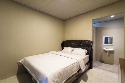 Фотография гостиницы RedDoorz near Taman Merdeka Metro Lampung