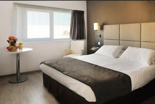 Фотография апарт отеля Séjours & Affaires Courbevoie Grande Arche