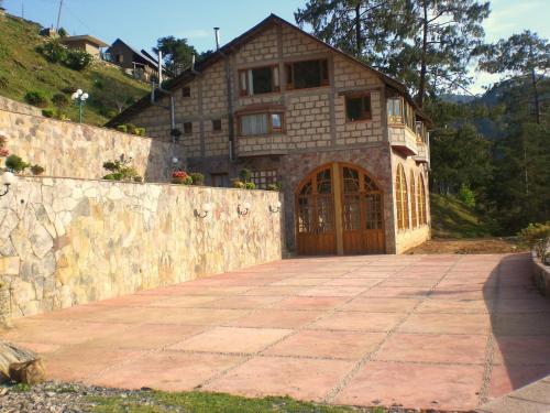 Фотография гостевого дома Cabañas 5 Pinos