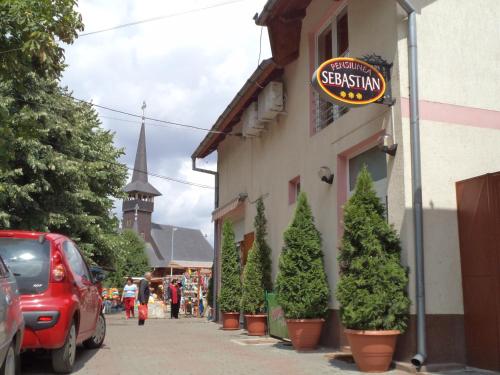 Фотография гостевого дома Pensiunea Sebastian