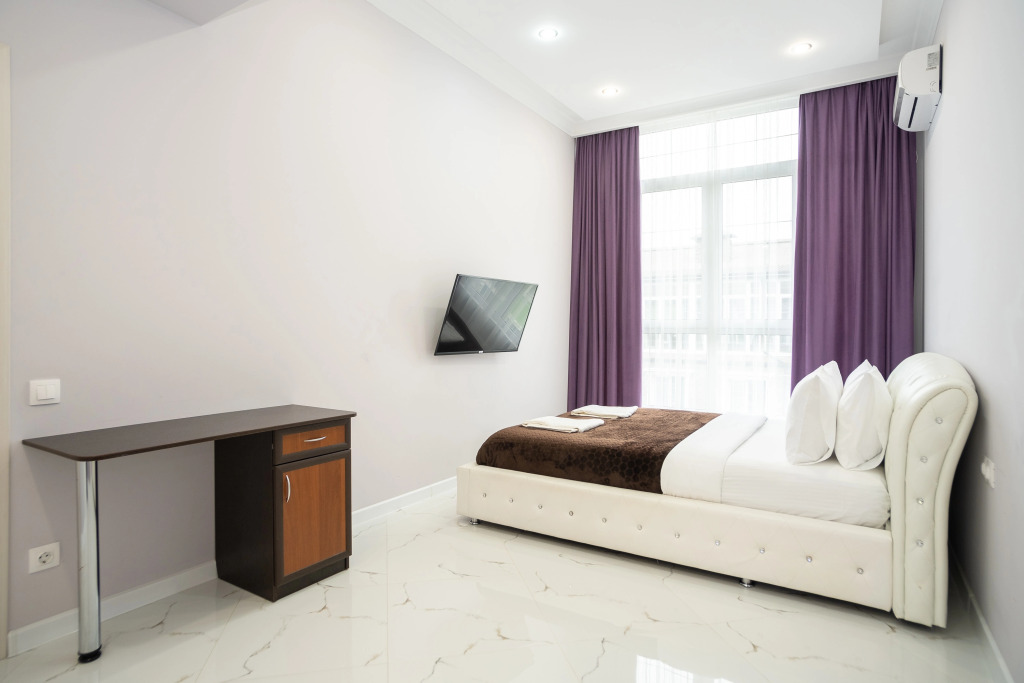 Фотография квартиры Апартаменты Red Apartments Арт Лайт Сити Апартамент Вольтер