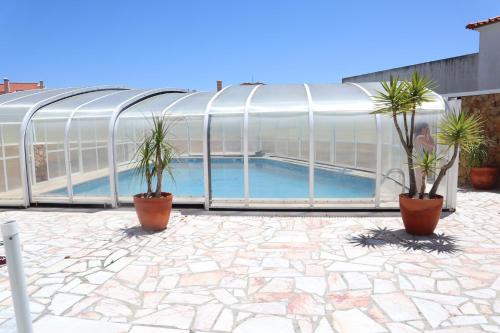 Фотография гостевого дома Dii Beach House Piscina Interior Aquecida