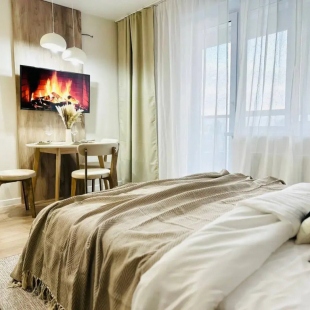 Фотография квартиры Квартира Поделам с балконом на 14 этаже у арены Трактор