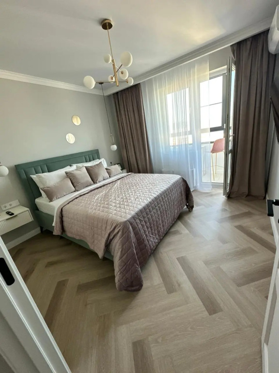 Фотография квартиры Апартаменты UzorApart УзорАпарт с Тремя Спальнями и Панорамным видом на Море