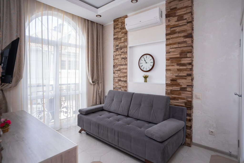 Фотография квартиры Апартаменты Red Apartments Арт Лайт Сити Апартамент Роллан