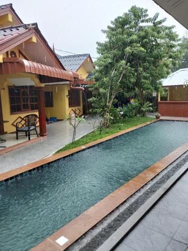 Фотография гостиницы OYO 75342 Ban Elephant Blanc Bungalow