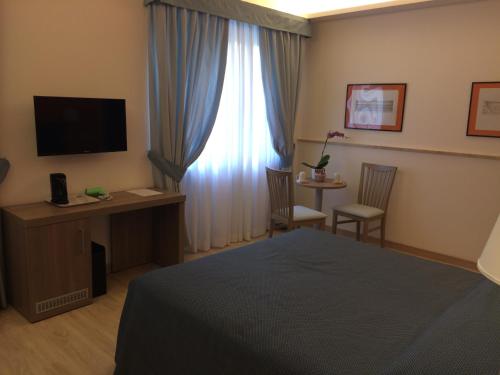 Фотография гостевого дома Fleming Suites