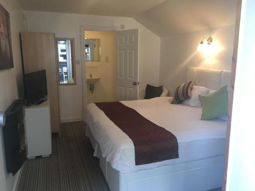 Фотография гостевого дома Woodland Lodge