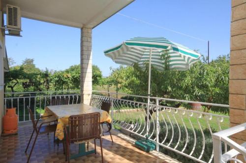 Фотография гостевого дома Apartments with a parking space Basanija, Umag - 7149