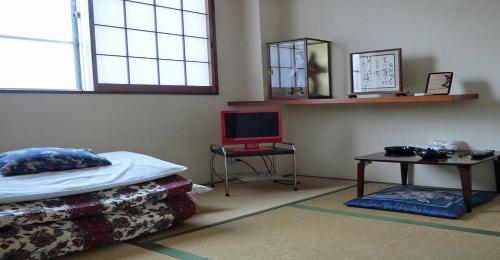 Фотография гостиницы Ryokan Suzukisou-tatami room No bath and toilet- Vacation STAY 17862