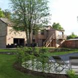 Фотография гостевого дома Beautiful holiday home with jacuzzi, sauna and monumental fireplace