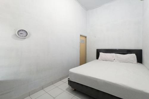 Фотография гостиницы OYO 3994 Wisma Amalia Syariah