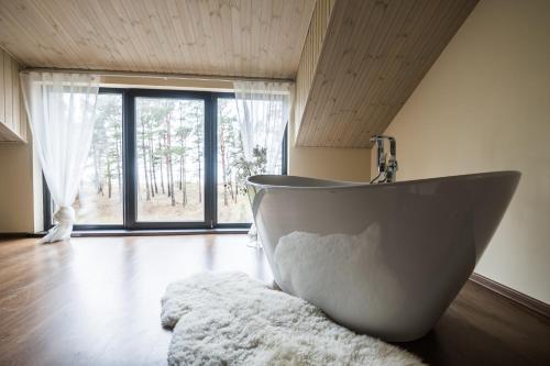 Фотография гостевого дома Jūras Krasti Romantika