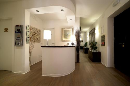 Фотография гостевого дома Olympic Charme