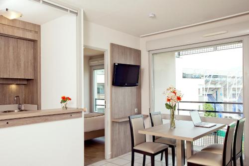 Фотография апарт отеля Séjours & Affaires Clermont Ferrand Park République