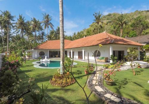 Фотография гостевого дома Villa Rizki Candidasa