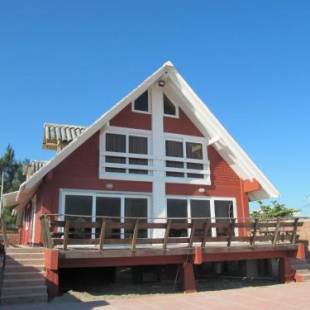 Фотография гостевого дома Chatet Suizo al pie del mar