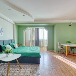 Фотография квартиры Квартира Просторные апартаменты на Арбате с панорамным видом на город и горы