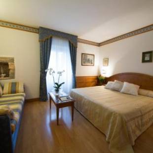 Фотографии гостиницы 
            Hotel Locanda Al Pomo d'Oro