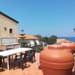 Фотография гостевого дома One bedroom house at Marina di Caronia 200 m away from the beach with sea view furnished terrace and wifi