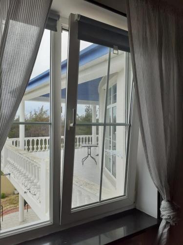 Фотография гостевого дома Голубая бухта на Краснодарской