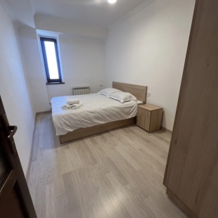 Фотография квартиры Квартира A two-bedroom apartment with a living room and a balcony in the city center.