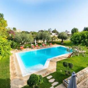 Фотографии гостевого дома 
            Il Giardino Dei Carrubi