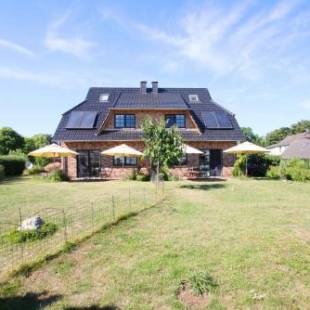 Фотографии гостевого дома 
            Ostseehaus Odin Doppelhaushälfte