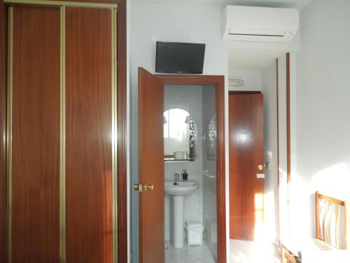 Фотография гостевого дома Pension Cuatro Torres