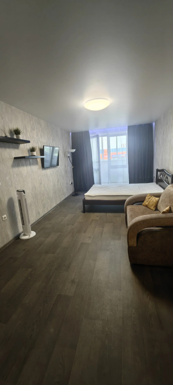 Фотографии квартиры 
            Квартира студия на Строителей с видом на ТЦ Планета