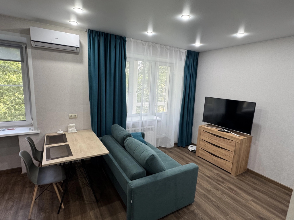 Фотография квартиры Квартира Уютная студия в центре города в тихом зеленом дворе