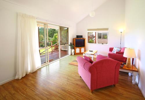 Фотография базы отдыха Poinciana Cottages