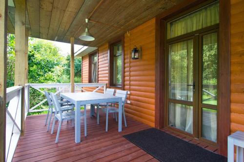 Фотографии гостевого дома 
            Домик у пруда. SPA Усадьба