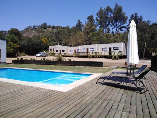 Фотография апарт отеля cabañas laguna de zapallar maitencillo