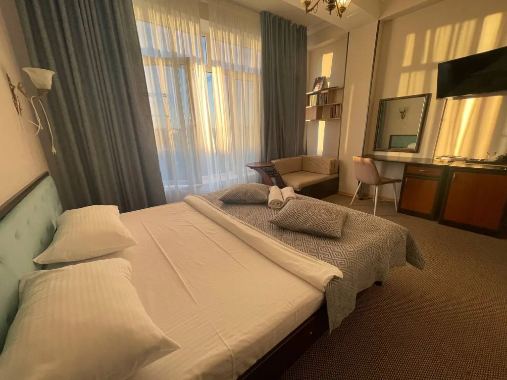 Фотография квартиры Апартаменты До пляжа — всего 30 секунд пешком