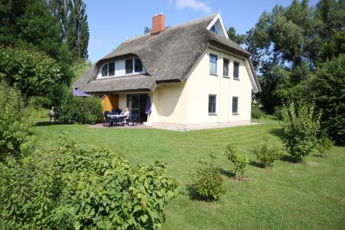 Фотография гостевого дома Reetdachhaus Weißdorn 1