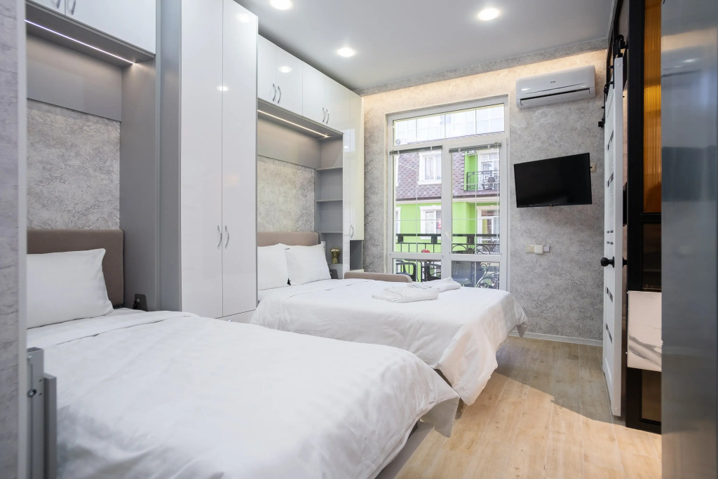 Фотография квартиры Апартаменты RED APARTMENTS Арт Лайт Сити апартамент Бенуа